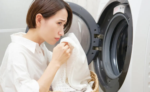how to clean a washing machine that smells bad